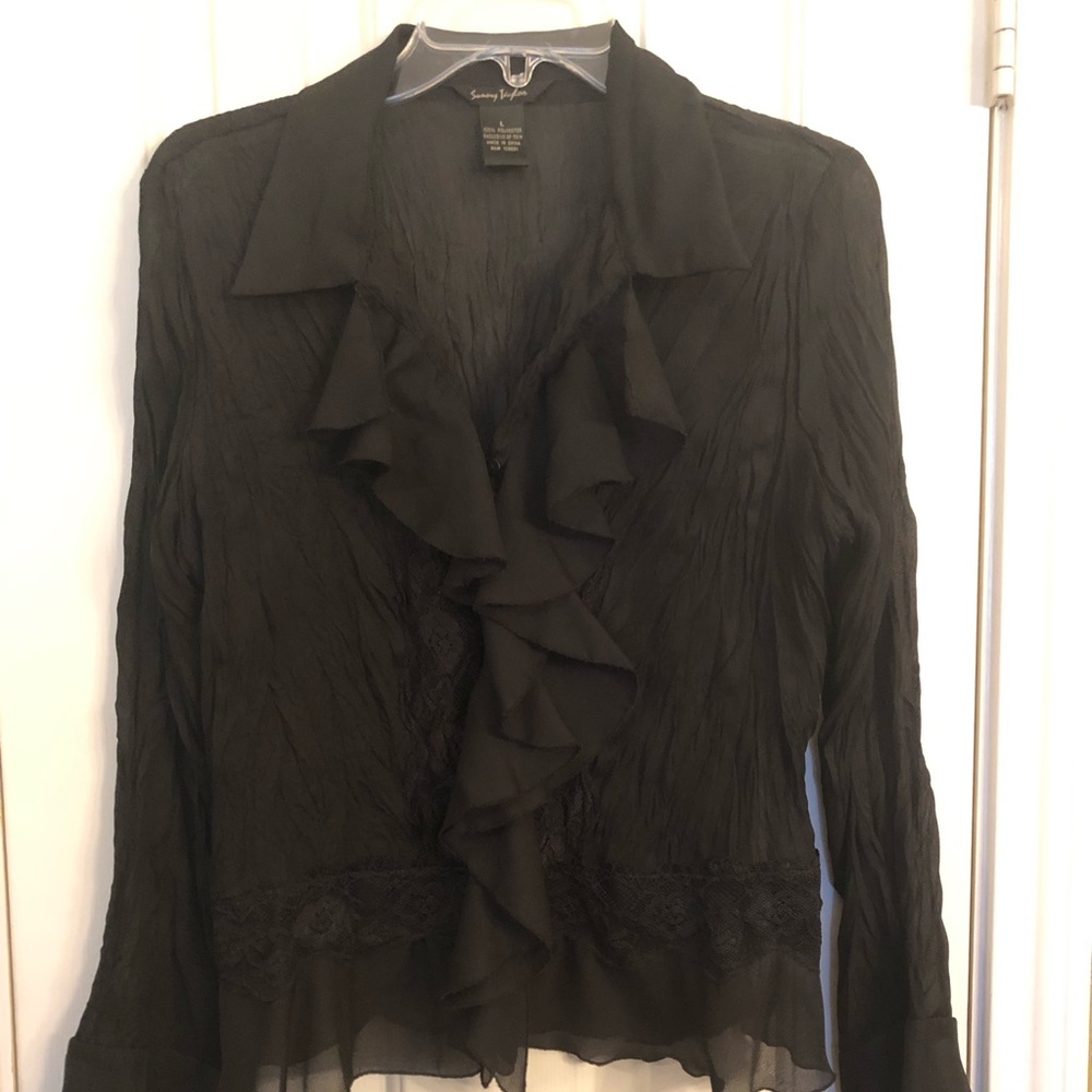 Black long sleeved top with ruffles